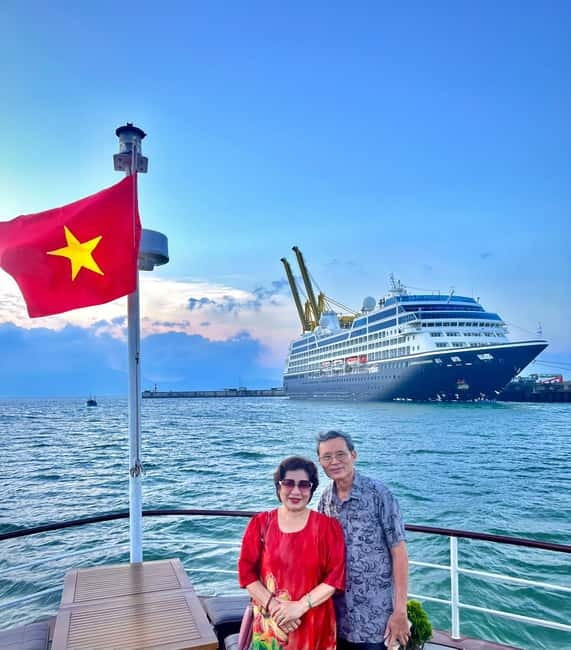 Da Nang: Experience a Magical Sunset Dinner Cruise in DN Bay - The view: skyline cruising on calm water at dusk