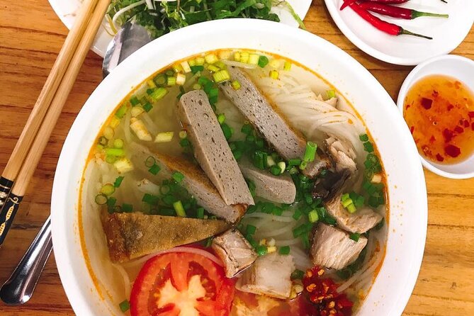 Da Nang Food Tour Motorbike & Sightseeing By Ao Dai Lady Rider - Getting around Da Nang fast: how the pickup and timing affect your evening