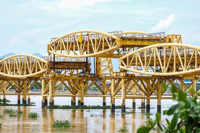 Da Nang Night Foodie Tour City and Han River Cruise By Private - Your guide matters: Ao Dai hosting, English explanations, and getting the best seats