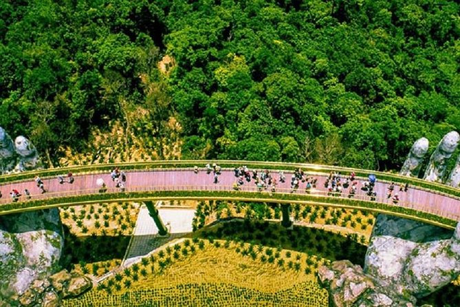 Golden Bridge & BaNa hills Group trip from DaNang/Hoi An - French Village: mini Europe, stone church, and street-festival energy