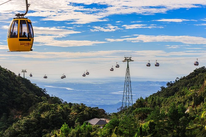 PREMIER TOUR - Discover Golden Bridge and Ba Na hill - Small group by Mini Van - Pagodas and gardens: Linh Ung Pagoda and the 27m Buddha